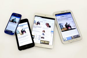 Telefonos moviles e tablets com a aplicacion do diário O Pais